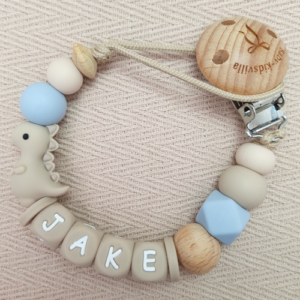 Speenkoord met naam jongen dino beige