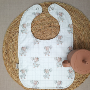 Handgemaakte waterproof babyslab dinofeest