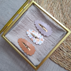 Haarspeldjes ribbel open design noten bruin