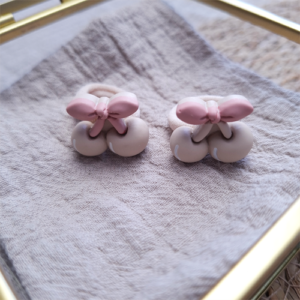 Haarelastiekjes kersjes beige